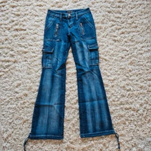 Vintage spodnie dzowny Opium jeansy flared