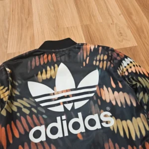 Adidas Rita ora bluza Na zamek