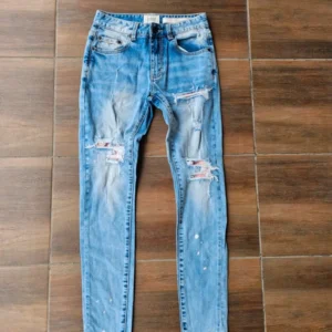 Amicci Jeansy slim fit z dziurami
